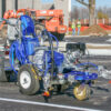 Graco LineLazer 3900 line striping machine, shown with durable construction and ergonomic handles, ideal for precise line marking on parking lots, roads, and sports fields